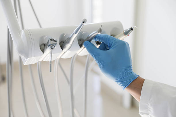 Professional Invisalign Clear Aligners technician working in Jupiter Farms, FL